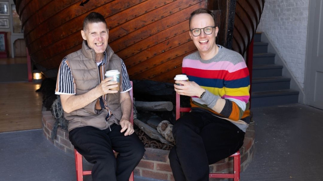 Together Co befriending pair having coffee